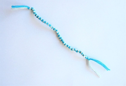 Hand-knitted bracelet present to the order