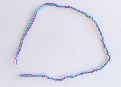 Hand-knitted bracelet present to the order