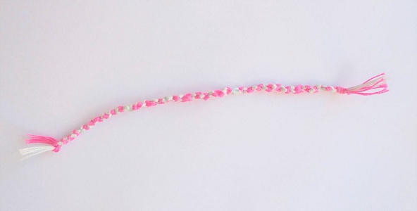 Hand-knitted bracelet present to the order