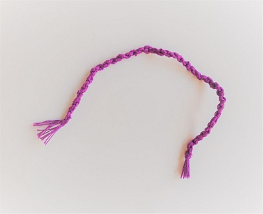 Hand-knitted bracelet present to the order