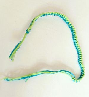 Hand-knitted bracelet present to the order