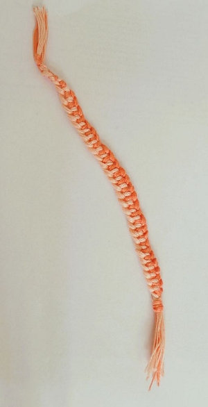 Hand-knitted bracelet present to the order
